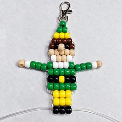 Free beaded Christmas elf ornament instructions showing where the two cords come out after completing the pony bead buddy elf pattern.