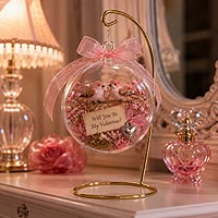 Valentine's Day fillable ornament craft project featuring ribbon roses and miniature love notes for handmade keepsakes and decorations.