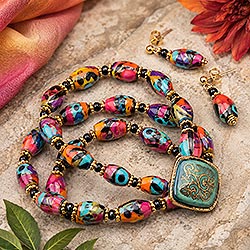 Unique bracelets and earrings set made with beads and buttons that you can make yourself with this free beaded jewelry pattern. Image features 3 strands using colorful beads.