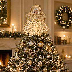 Gold trimmed Plastic canvas Angel decorated with pearls with soft lights under her skirt being used as a tree topper.